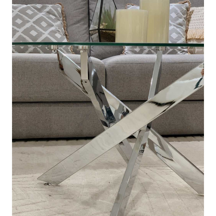 Mesa centro de cristal redonda DAN con patas cruzadas